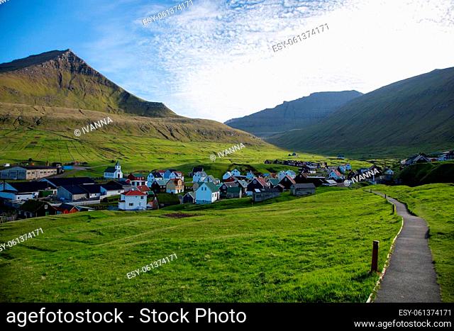 beautiful view of the Faroe Islands and the village with many cozy houses