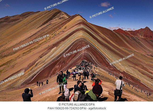 02 May 2019, Peru, Cusco: The Vinicunca, or the Rainbow Mountain with a height of 5200 meters above zero lies in the south of Peru and develops more and more...