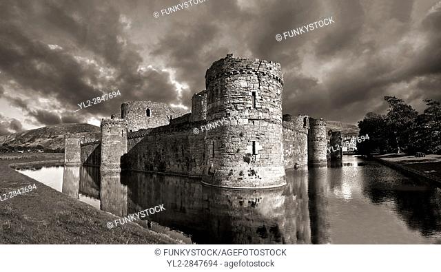 Beaumaris Castle, looking towards Snowdonia, built in 1284 by Edward 1st, considered to be one of the finest example of 13th century military architecture by...