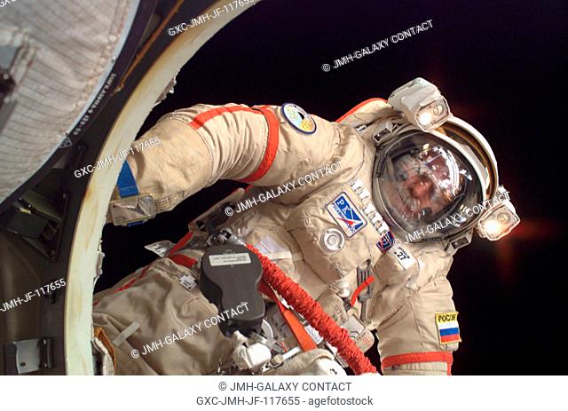 Attired in a Russian Orlan spacesuit, astronaut John L. Phillips, Expedition 11 NASA Space Station science officer and flight engineer