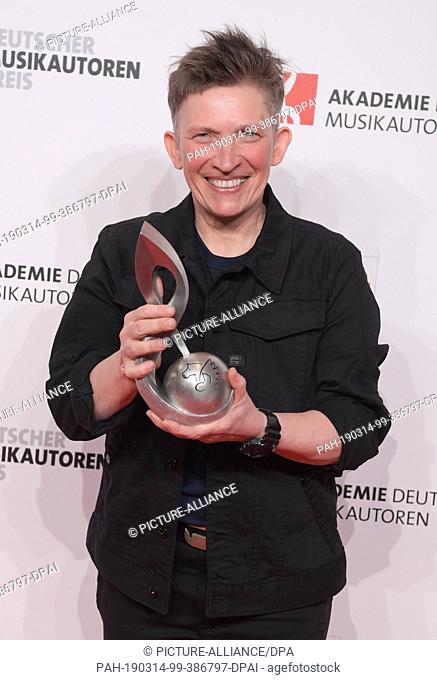 14 March 2019, Berlin: Song writer Suli Puschban receives the trophy in the category ""Text Children's Song"" at the 11th German Music Author Award