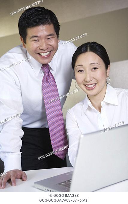 Businesspeople smiling
