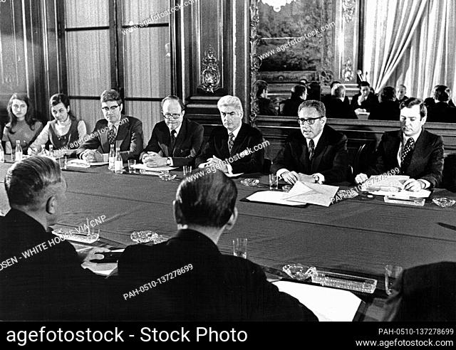 In this photo released by the White House, Dr. Henry A. Kissinger, second right, leads the United States delegation to the Paris Peace talks at the...