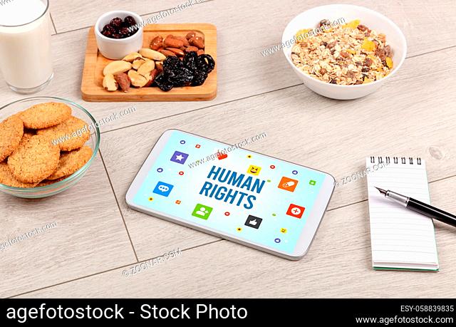 Healthy Tablet Pc compostion with HUMAN RIGHTS inscription, Social networking concept