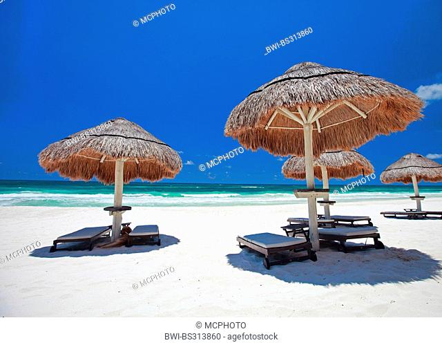 canvas chairs and sunshades on stunning tropical beach, Mexico, Tulum