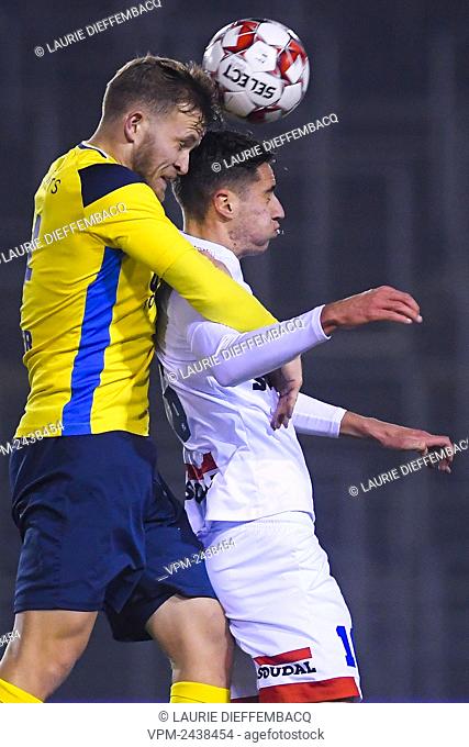Westerlo's Kyan Vaesen and Union's Jonas Bager fight for the ball during a soccer game between Royale Union Saint-Gilloise (1b) and Westerlo (1b)
