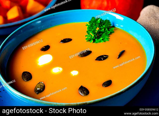 delicious creamy pumpkin soup with coconut milk