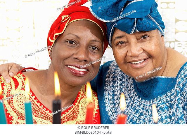 African American mother and daughter in traditional clothing