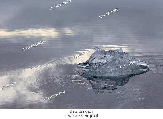 Iceberg detail with reflection, Jokulsarlon lagoon sunrise, Icel