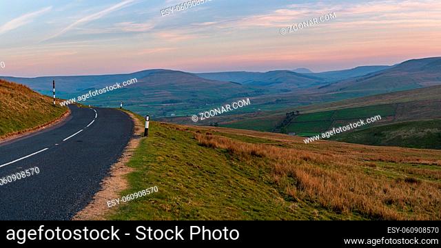 Driving on the Buttertubs Pass (Cliff Gate Rd) between Thwaite and Simonstone, North Yorkshire, England, UK