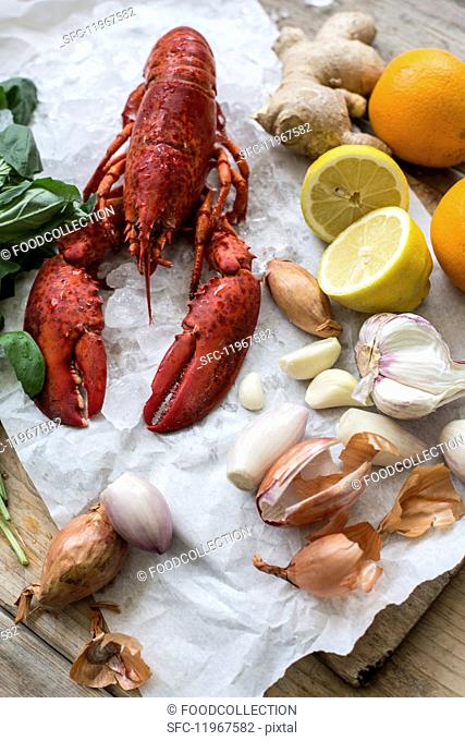 Cooked lobster and various ingredients on a piece of paper