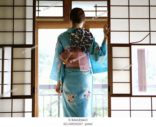 Woman wearing Yukata and paperfan