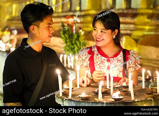 MYANMAR, BAGAN - OCTOBER 29, 2023: Full moon candle lighting ceremony at the Shwezigon Pagoda. Yuri Smityuk/TASS