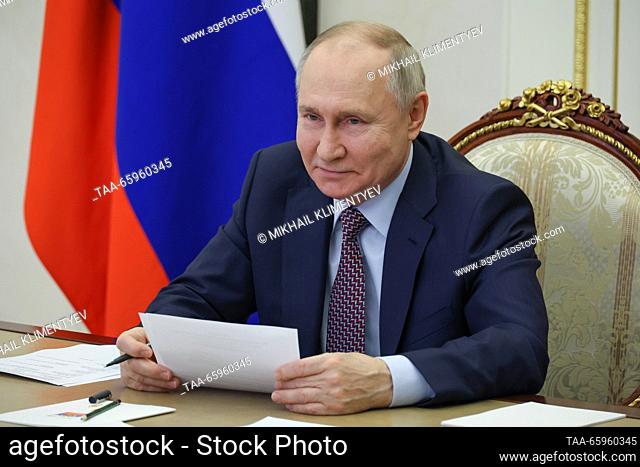 RUSSIA, MOSCOW - DECEMBER 21, 2023: Russia's President Vladimir Putin takes part in the opening ceremony of M12 Highway via a video link from Moscow's Kremlin