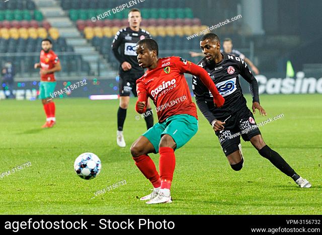Oostende's Alfons Amade and Kortrijk's Faiz Selemani fight for the ball during a soccer match between KV Oostende and KV Kortrijk