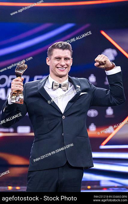 17 December 2023, Baden-Württemberg, Baden-Baden: Lukas Dauser stands on stage after receiving the ""Sportsman of the Year 2023"" award