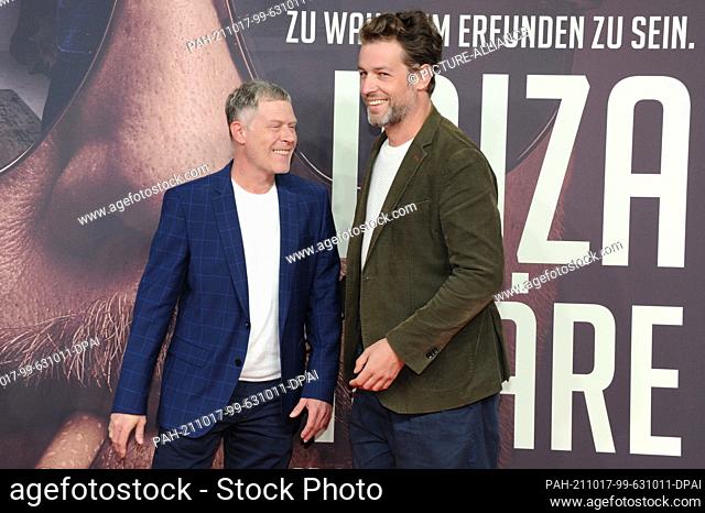 17 October 2021, Bavaria, Munich: Actors Andreas Lust (l) and Julian Looman arrive for the German premiere of the Sky series ""The Ibiza Affair"" at the Astor...