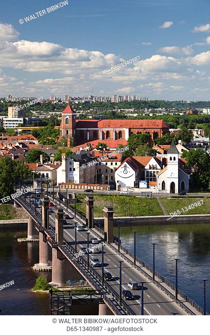 Lithuania, Central Lithuania, Kaunas, elevated view of Sts  Peter and Paul Cathedral, Aleksoto tiltas bridge, and Nemunas riverfront, late afternoon