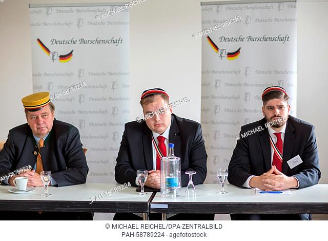 Torben Braga (C), spokesman of the German Fraternity, and his deputy Philip Stein (R) attend a press conference with spokesperson Walter Tributsch in Eisenach