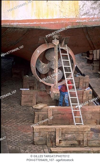 tourism, France, lower normandy, manche, cotentin, cherbourg, harbour, working in the drydock in the outer harbour, propeller, shipyard, dockyard, shipyard