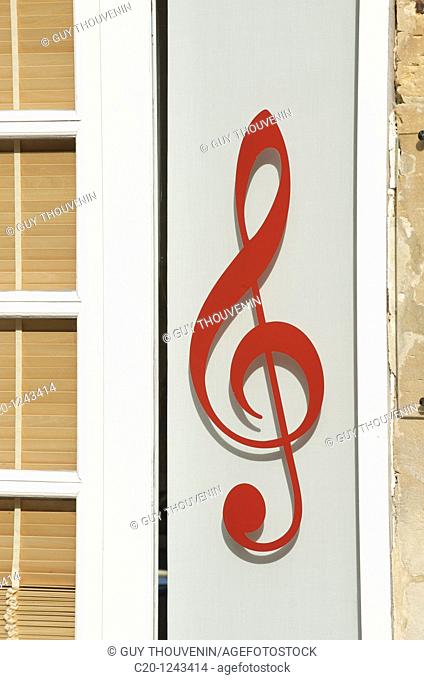 A lovely decorated door with a music key outside Bayeux, Calvados, Lower Normandie, France