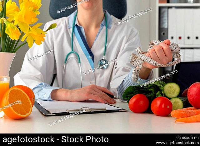 Vegetable diet nutrition and medication concept. Nutritionist offers healthy vegetables diet. In a natural light