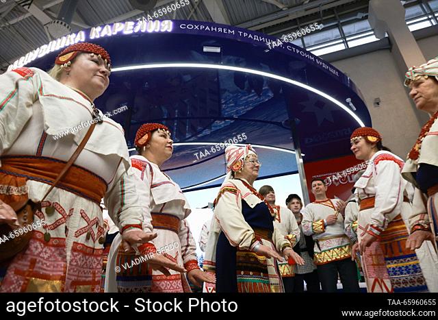 RUSSIA, MOSCOW - DECEMBER 21, 2023: Members of the Kantele folk song and dance ensemble perform during the opening of Karelia Republic Day at the Russia Expo...
