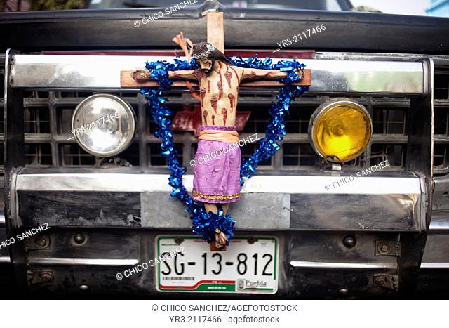 An image of crucified Jesus Christ decorates a truck at the pilgrimage to Our Lady of Guadalupe Basilica in Mexico City, Mexico, December 11, 2013