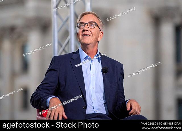 01 August 2021, Berlin: Dietmar Bartsch, top candidate of the Left Party, sits on the terrace of the Marie-Elisabeth-Lüders-Haus during the ARD summer interview