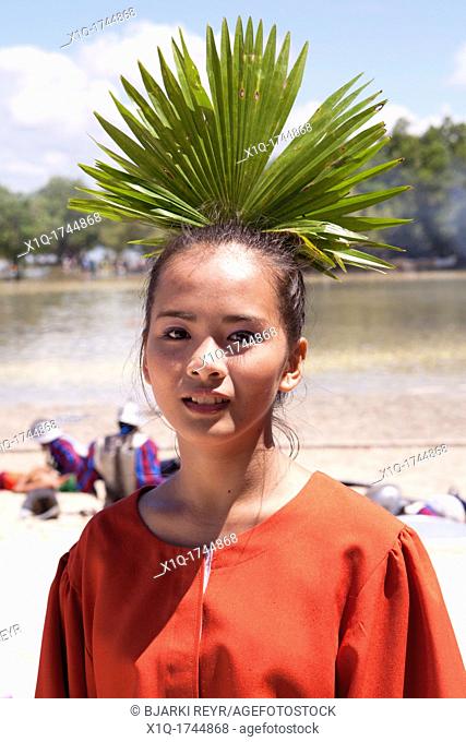 Filipina wearing a traditional dress and Anahaw leaf at the Battle of Mactan reenactment or Kadaugan Festival  The Battle of Mactan was fought in the...