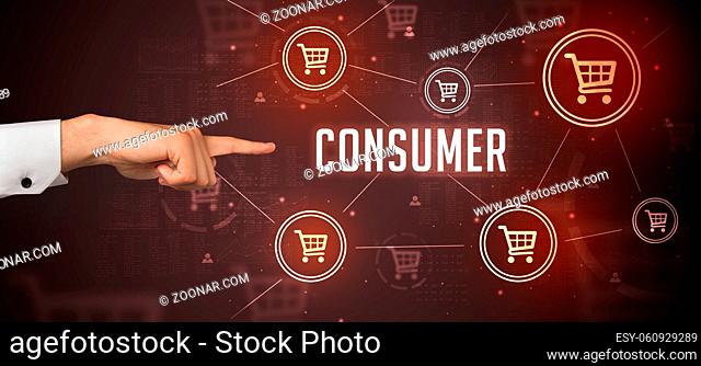 Close-Up of cropped hand pointing at CONSUMER inscription, online shopping concept