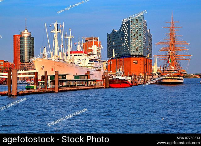 Oversea bridge by museum ship Cap San Diego and sailing ship Amerigo Vespucci in the harbour with Elbe philharmonic, Hamburg, country Hamburg, North Germany