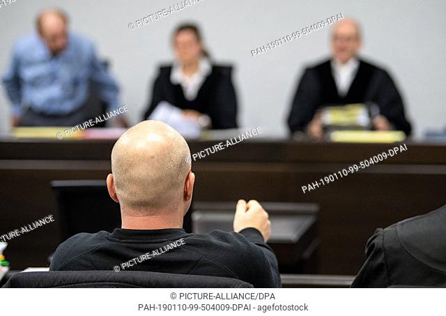 10 January 2019, Baden-Wuerttemberg, Stuttgart: A defendant sits in his seat at the beginning of a new trial against two alleged leaders of the Association of...