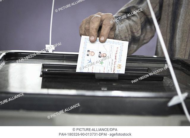 Egyptian man casts his vote on the first day of the 2018 Egyptian presidential elections, at a polling station, in Cairo, Egypt, 26 March 2018