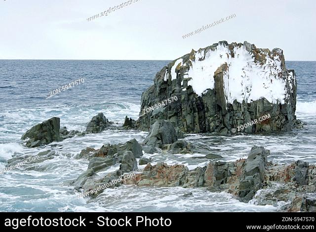 Rocky island in the Southern Ocean off the coast of Antarctica