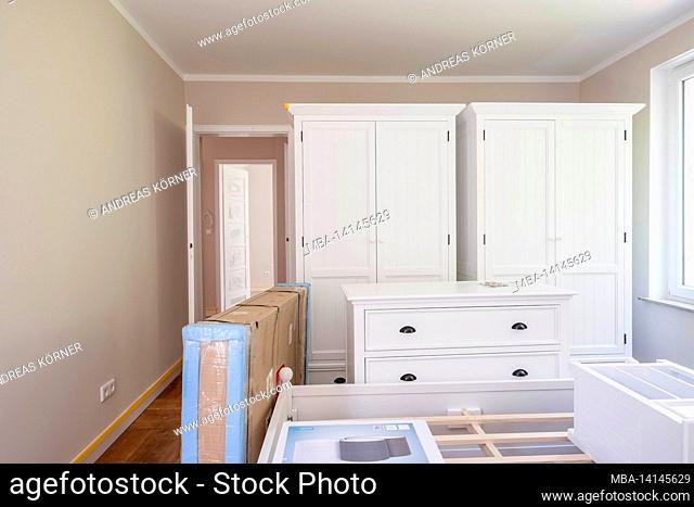 construction site, refurbishment and renovation of an apartment, furniture in a renovated room