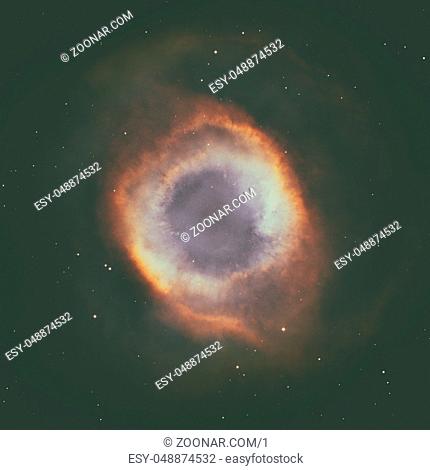 The Helix Nebula or NGC 7293. It is one of the nearest planetary nebulae to Earth, only 650 light years away. Located in the constellation Aquarius