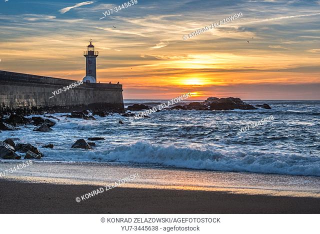 Sunset over Atlantic Ocean. View from Carneiro beach in Foz do Douro district of Porto city, second largest city in Portugal