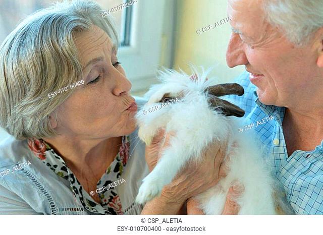 Senior couple with rabbit