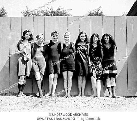 Washington, D.C.: May 29, 1920.Bare legs and scanty one piece bathing suits were very much in evidence at the opening of Washington's municipal bathing beach...