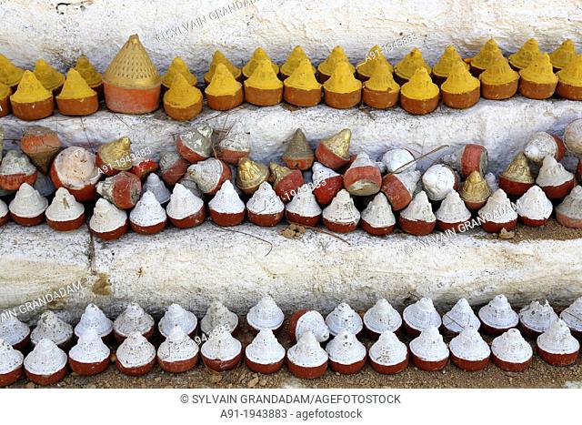 Bhutan (kingdom of), along river Thimphu, small potteries containing ashes of deceased peoples