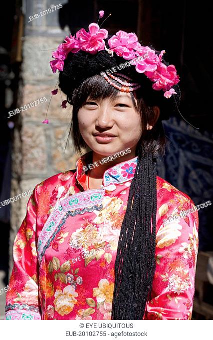 Mosuo girl wearing a colourful costume