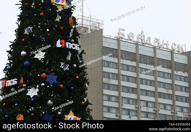RUSSIA, ZAPOROZHYE REGION - DECEMBER 19, 2023: A Christmas tree is pictured near the Berdyansk Hotel in the city of Berdyansk. Alexei Konovalov/TASS