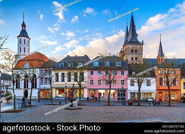 Market Square with hiatorical houses and cathedral in Xanten city, Germany