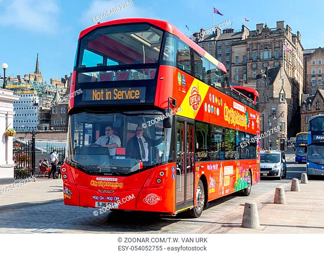 Edinburgh, Scotland - May 24, 2018: Sightseeing bus near Royal Mile and Waverley station in Edinburgh