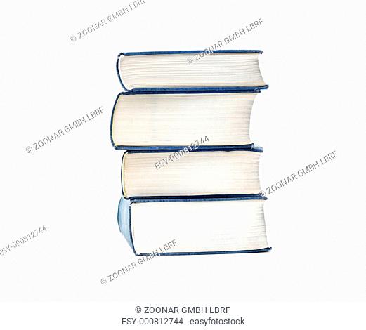 Pile of thick books isolated on white