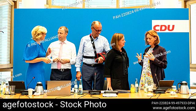 24 August 2022, Berlin: Julia Glöckner (CDU, l-r), member of the German Bundestag, Mario Czaja, CDU Secretary General, Friedrich Merz, CDU leader, Yvonne Magwas