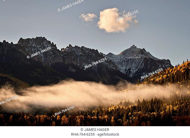 Snow-covered mountain in the fall with fog, Uncompahgre National Forest, Colorado, United States of America, North America