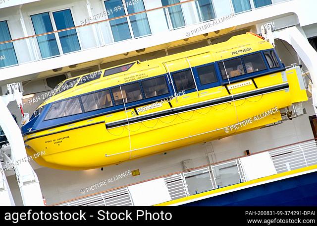 30 August 2020, Lower Saxony, Papenburg: A lifeboat, which can also be used as a tender boat, is suspended in a fixture on board the new cruise ship ""Spirit of...