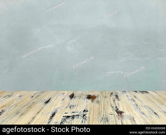 washed wood table with concrete texture background